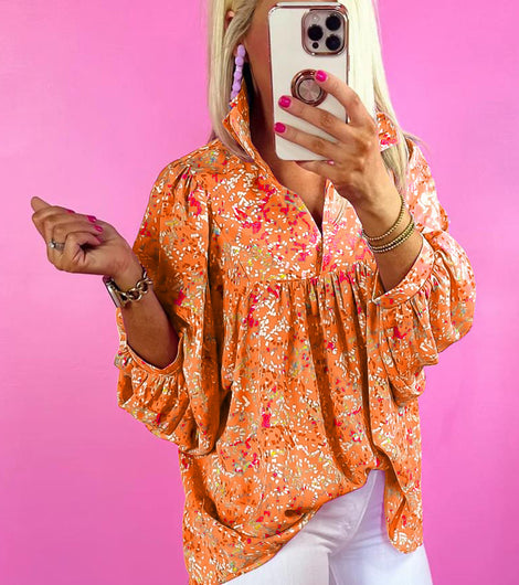 Orange Abstract Print Loose Fit Collared V Neck Babydoll Blouse